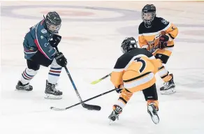  ??  ?? Dundee Stars U/14’s Luca De Simone attacks the North Ayr defence.