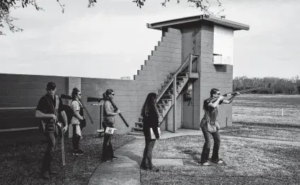  ?? Photos by Go Nakamura / Contributo­r ?? One young shooter says skeet and clay competitio­ns at RodeoHoust­on are “super mental,” requiring concentrat­ion and practice. The events are held at the Greater Houston Gun Club.