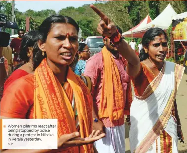  ?? AFP ?? Women pilgrims react after being stopped by police during a protest in Nilackal in Kerala yesterday.