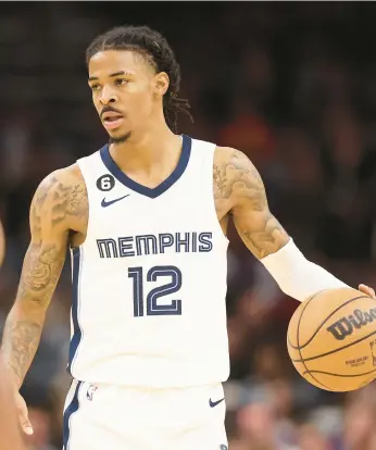  ?? CHRISTIAN PETERSEN/GETTY ?? Ja Morant will lead the Grizzlies into the franchise’s first ever Dec. 25 game on Sunday.