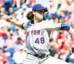  ?? (Reuters) ?? JACOB DEGROM pitched a dominant one-hit, 105-pitch, complete-game shutout in the New York Mets’ 5-0 win over the Philadelph­ia Phillies on Sunday, with the only hit he allowed coming from opposing starter Zach Eflin.