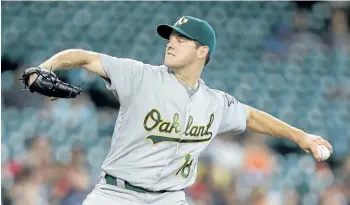  ?? BOB LEVEY/AFP/GETTY IMAGES ?? Oakland starting pitcher Rich Hill figures to be one of the most sought-after players at the MLB trade deadline.