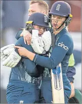  ?? ?? England’s Charlie Dean (right) is consoled after being run-out