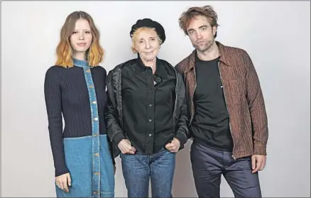  ?? Jay L. Clendenin Los Angeles Times ?? CLAIRE DENIS, flanked by “High Life” stars Mia Goth and Robert Pattinson, took off in space for her English-language film debut.