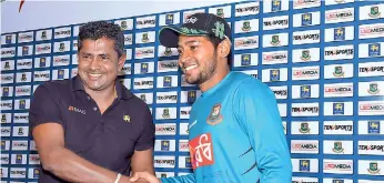  ??  ?? Sri Lanka Skipper Rangana Herath (L) and Bangladesh Captain Mushfiqur Rahim at the press conference Pic by Pradeep Pathirana