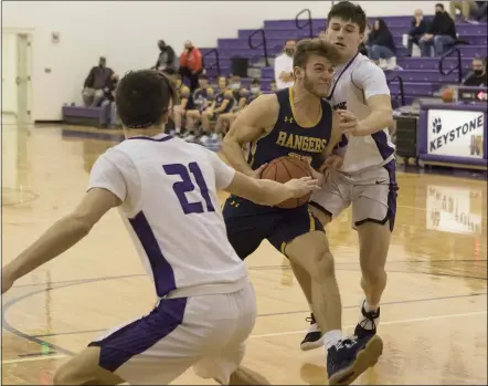  ?? JENNIFER FORBUS — FOR THE MORNING JOURNAL ?? North Ridgeville’s Dom Farago drives to the hoop during his team’s win over Keystone on Feb. 16.