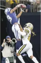  ?? GETTY IMAGES ?? The Cowboys’ Michael Gallup catches a touchdown pass behind the Saints’ Bradley Roby on Thursday night.