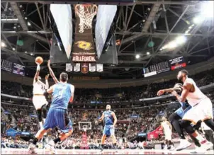  ??  ?? Kyrie Irving of the Cleveland Cavaliers shoots against the Orlando Magic at Quicken Loans Arena in Cleveland on Saturday.