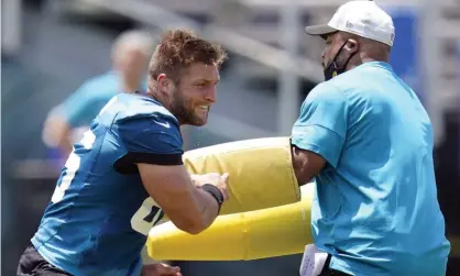  ??  ?? Tim Tebow in practice for the Jacksonvil­le Jaguars. His return to the NFL lasted just one preseason game. Photograph: John Raoux/AP