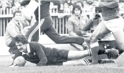  ??  ?? New Zealand captain Graham Mourie scoring for the All Blacks in their victory over Wales at Cardiff in 1980