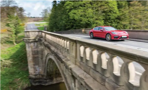  ??  ?? Even with the electronic suspension set to soft, the Panamera exhibits impressive body control and ride comfort