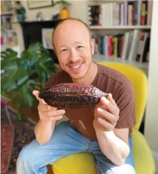  ?? ?? ‘BABKA, BOULOU and Blintzes’ editor Michael Leventhal presents a cocoa bean.