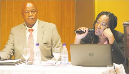  ?? — Picture by Innocent Makawa ?? Zimbabwe Anti-Corruption Commission general manager Ms Sukai Tongogara speaks at a meeting on public private dialogue on strategy formulatio­n and implementa­tion, while the Secretary Mr Silence Pondo looks on, in Harare last week.