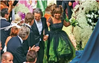  ?? ?? Tina Turner challenged the norm, wearing a black wedding gown to her nuptials.