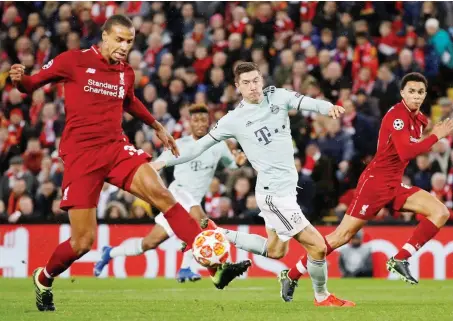  ?? Reuters/File ?? Liverpool have been handed an injury boost with the news Joel Matip, left, is fit to return at center-back.