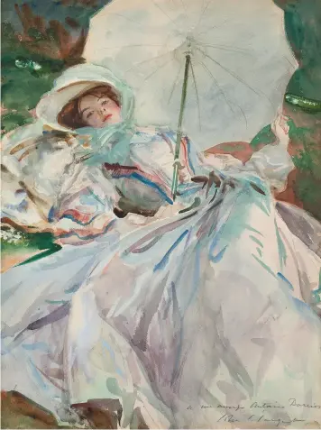  ??  ?? The Lady with the Umbrella (1911) demonstrat­es Sargent exploring the effects of sunlight and shade on costume using thin washes of colour