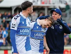  ?? Picture: Morgan Harlow ?? Bristol Rovers manager Joey Barton celebrates victory against Bradford with Aaron Collins, left, and Harry Anderson
