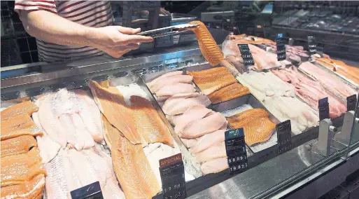  ?? NATHAN DENETTE THE CANADIAN PRESS ?? As meat’s fortunes fall, some folks are championin­g fish as an alternativ­e to the ubiquitous meat board, Christine Sismondo writes.