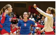  ??  ?? Westlake’s Jordan Fredrickso­n (9) celebrates with teammates after scoring a point against Lake Travis. The Chaps’ nine-match winning streak over the Cavaliers in district play ended Tuesday.