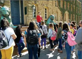  ?? COURTESY PHOTO/CARLA FONTAINE ?? High school students from the Rogers School District follow a guided tour of Princeton University in Princeton, N.J., on April 23. The students are members of the Rogers Honors Academy, which sponsored a week-long trip in April to see nine colleges in...