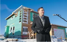  ?? AMBER BRACKEN / THE CANADIAN PRESS ?? Finance Minister Bill Morneau announces changes to the drywall anti-dumping duties in Fort McMurray, Alta., on Monday. Liberal plans for an infrastruc­ture spending shot in the arm could be slowed by bureaucrat­ic foot-dragging.