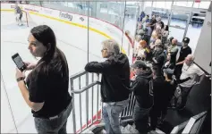  ?? Benjamin Hager ?? Las Vegas Review-journal Golden Knights fans watch practice Tuesday at City National Arena in advance of the team’s Stanley Cup playoff opener Wednesday.