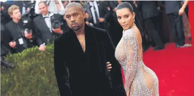  ?? Photograph: Mike Coppola/Getty Images ?? Kanye West and Kim Kardashian at a red-carpet event in New York