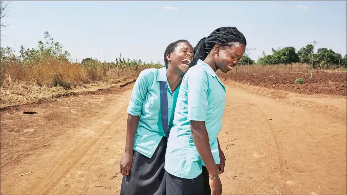  ?? PICTURES: JULIA GUNTHER ?? Internatio­nal phtographe­r Julia Gunther documents an unusual project in Malawi, the making of reusable sanitary pads (in beautiful material) as a contributi­on to keeping girls at school.