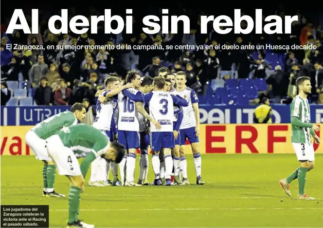  ?? JAIME GALINDO ?? Los jugadores del Zaragoza celebran la victoria ante el Racing el pasado sábado.