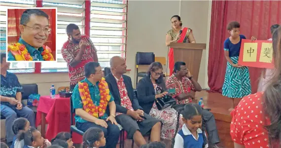  ?? At the Salote Qalubau ?? From left: The People’s Republic of China Ambassador to Fiji Zhou Jian (insert) and the Commission­er West Apolosi Lewaqai during the Internatio­nal Chinese Language Day Lautoka Zhong Hua School on April 20, 2023. Photo: