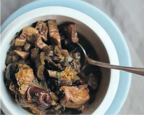  ??  ?? Braised pork with plums and olives is a delicious Moroccan recipe from Les Merches Français, a cookbook from Brian DeFehr and Pauline Boldt.