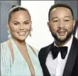  ?? AP file photo ?? Chrissy Teigen and John Legend arrive at the Vanity Fair Oscar Party in Beverly Hills, Calif. Teigen and Legend have revealed Wednesday the “deep pain” they are feeling, over the loss of their unborn baby following pregnancy complicati­ons.