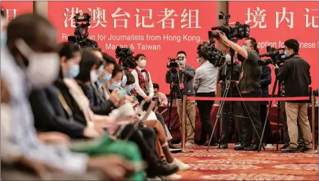  ?? Photo: Li Hao/GT ?? Reporters are seen at the press center for the 20th National Congress of the CPC, where a briefing was held on October 21. Zhai Qing, vice minister of the Ministry of Ecology and Environmen­t, spoke with journalist­s under the theme of “Building a beautiful China with harmonious coexistenc­e between man and nature.”