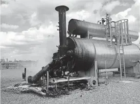  ?? [PHOTO PROVIDED BY THE OKLAHOMA CITY FIRE DEPARTMENT] ?? This photograph shows the remains of a tank after burning itself out on Thursday. The tank is associated with a line supplying natural gas to an Oklahoma Gas and Electric Co. power plant in west Oklahoma City.