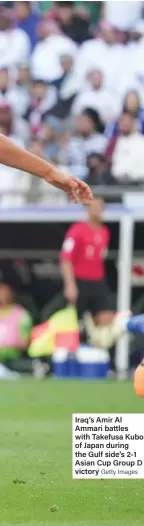  ?? Getty Images ?? Iraq’s Amir Al Ammari battles with Takefusa Kubo of Japan during the Gulf side’s 2-1 Asian Cup Group D victory