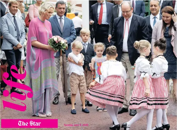 ?? Reuters ?? Prince Albert II of Monaco and his wife Princess Charlene arrive with their twins Prince Jacques and Princess Gabriella. Charlene is using her platform to do her bit in alleviatin­g hunger and unemployme­nt
|