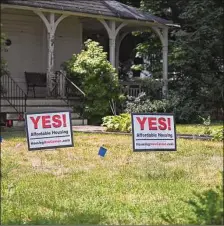  ?? Tyler Sizemore/Hearst Connecticu­t Media ?? Signs are displayed reacting to a proposed new developmen­t in New Canaan last year.