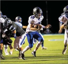  ?? NATE HECKENBERG­ER — FOR DIGITAL FIRST MEDIA ?? Kennett’s Mitch Kosara finds room to run on his way to a 14-yard touchdown in the third quarter against Great Valley.