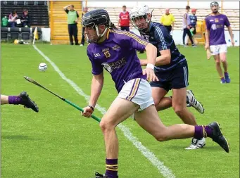  ??  ?? Influentia­l midfielder Jack Reck on the move for North Wexford in the first-half of Saturday’s final.