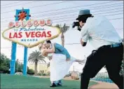  ?? Mel Melcon Los Angeles Times ?? KATY GARRETT and her husband, Stuart, pose for photograph­er Bobby Jameidar in Las Vegas in 2012.