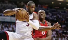  ?? ALAN DIAZ/THE ASSOCIATED PRESS FILE PHOTO ?? The JW Marriott in Miami is offering basketball skills training by Dwyane Wade, left, of the Cleveland Cavaliers as part of a two-night package.