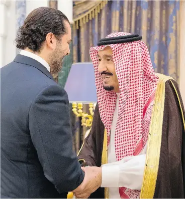  ??  ?? King Salman bin Abdulaziz al-Saud, right, greets former Lebanese prime minister Saad Hariri in Riyadh. Hariri’s resignatio­n on Saturday shocked his countrymen.