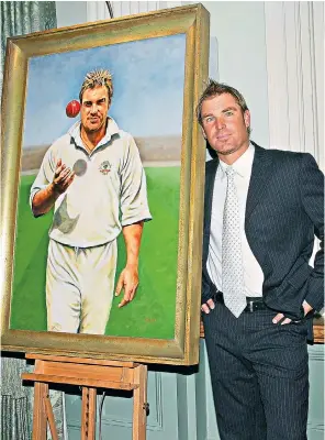 ??  ?? Australian Test great Shane Warne inspects his portrait – in its original form before the alleged revision