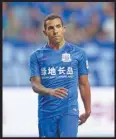  ?? STR / AFP ?? Carlos Tevez playing for Shanghai Shenhua in June.