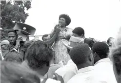  ??  ?? In this Sept. 17, 1965 file photo, Fannie Lou Hamer, of Ruleville, Miss., speaks
Washington after the House of Representa­tives rejected a challenger to the 1964 election of five Mississipp­i representa­tives. (AP Photo/william J. Smith, File)