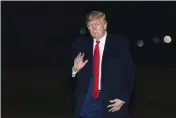  ?? MANUEL BALCE CENETA — THE ASSOCIATED PRESS ?? President Donald Trump waves upon arrival at the White House on Wednesday in Washington.