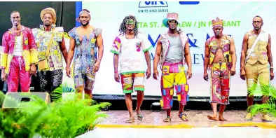  ?? CONTRIBUTE­D ?? Contestant­s in the Mr JTA St Andrew competitio­n on stage in their ‘Trashable Wear’ costumes, which are made from recyclable materials including plastic bags, old newspaper, plastic bottles, old CDs, bottle stoppers and crocus bags.