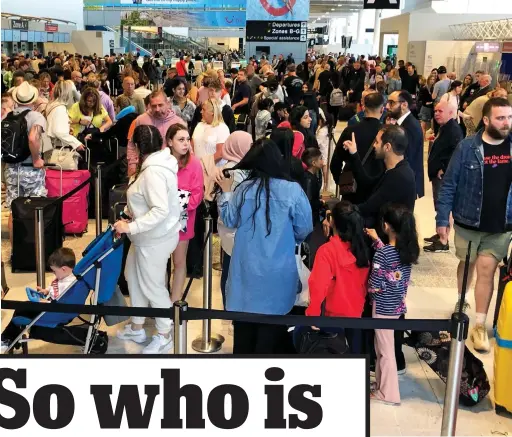  ?? ?? Mayhem: Travellers wait at Manchester, which has seen some of the worst disruption