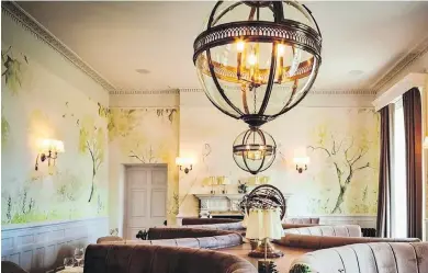  ?? SUBMITTED ?? Lympstone Manor’s dining rooms are warm and inviting, decorated with handpainte­d watercolou­r landscapes.