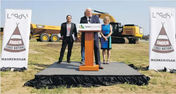  ?? JASON FRANSON, THE CANADIAN PRESS ?? Enoch Cree Nation Chief Bill Morin, left, Kinder Morgan Canada president Ian Anderson and Alberta Premier Rachel Notley speak at a ground-breaking ceremony at the Trans Mountain stockpile site west of Edmonton.